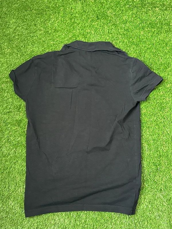 Boys age 14 (Large) Calvin Klein Polo shirt in black