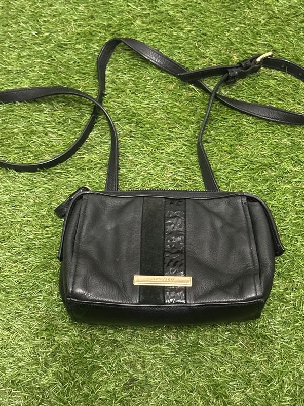 Cole Haan black zip crossbody bag with front stripe detail