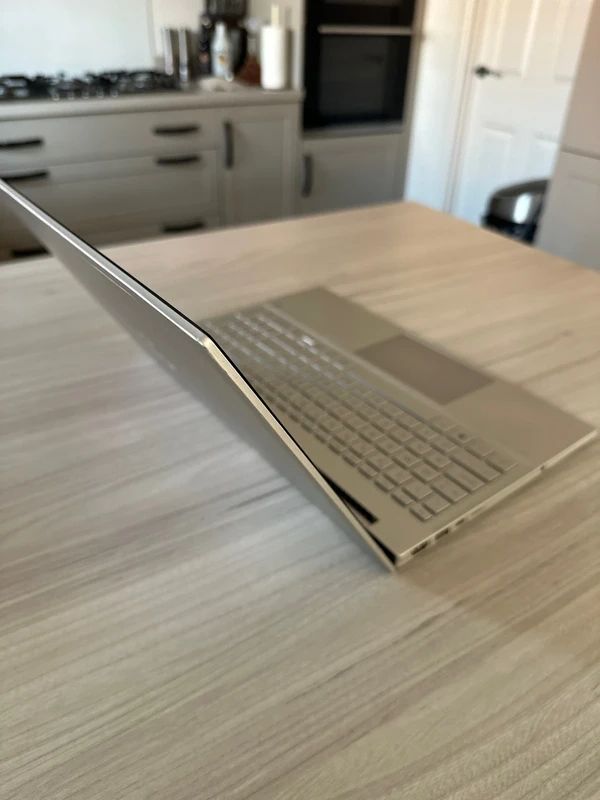 HP Pavilion Laptop 15-eh1xxx running Windows 11 with 16GB of RAM and an AMD Ryzen 7 5700U processor.