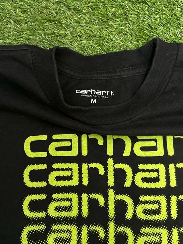 black Carhartt WIP Fading Script T-shirt features a lime green graphic logo print on the front