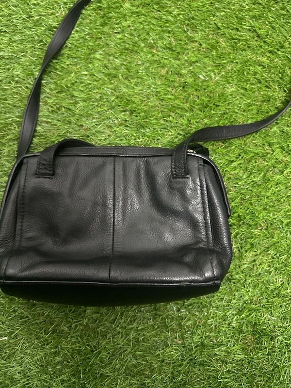 Cole Haan black zip crossbody bag with front stripe detail