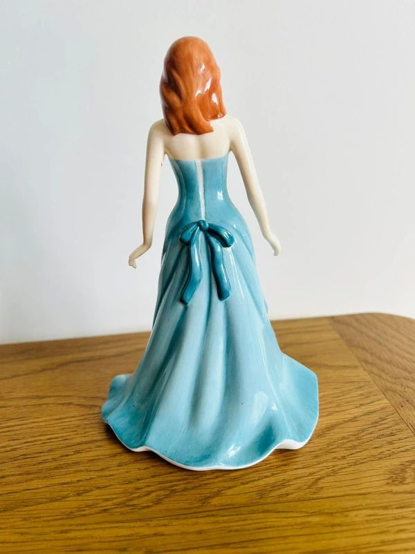 Royal Doulton " December " Turquoise Figurine