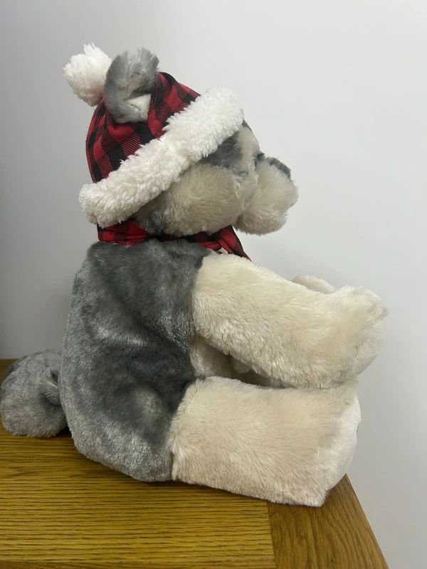 Build-A-Bear Workshop husky plush features a signature paw print logo.