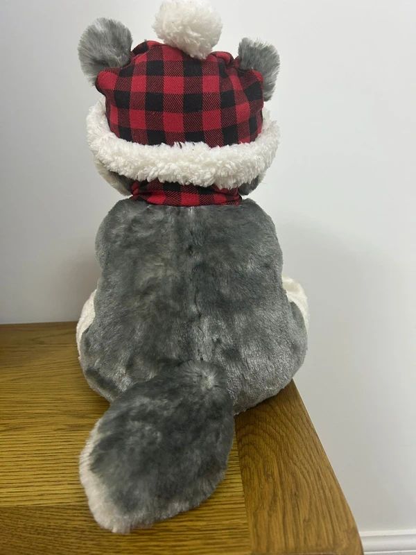 Build-A-Bear Workshop husky plush features a signature paw print logo.
