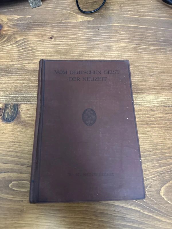 antique hardcover book titled Vom deutschen Geist der Neuzeit by W.R. Schweizer