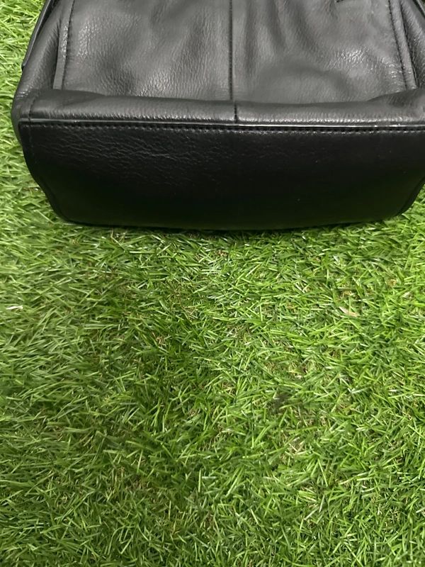 Cole Haan black zip crossbody bag with front stripe detail