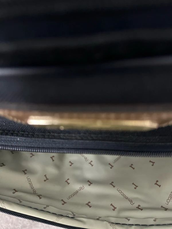 Revelation black and brown travel holdall bag with a detachable shoulder strap