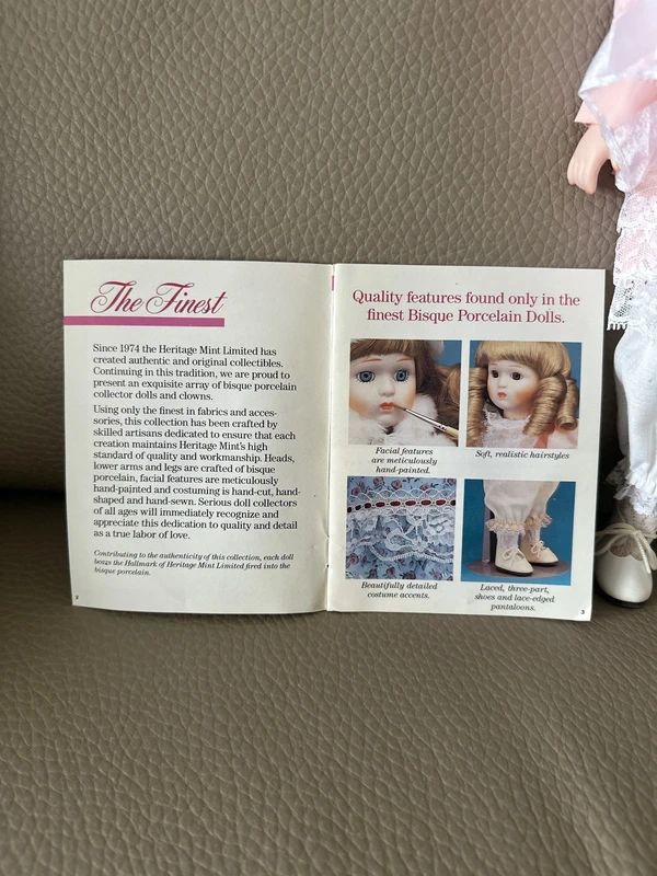 Heritage Mint Ltd. "Ashley" doll (D-23) is a 40 cm porcelain collector's item.