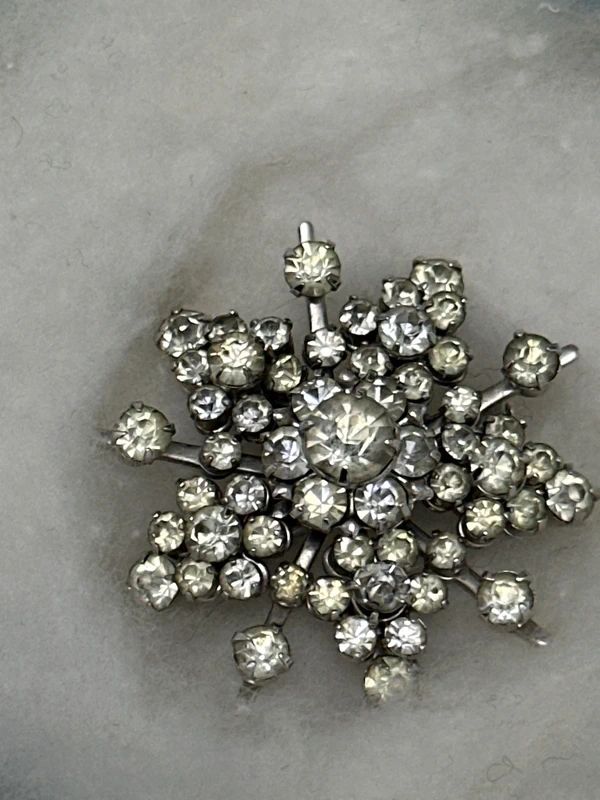 Vintage rhinestone brooch in a Birks box