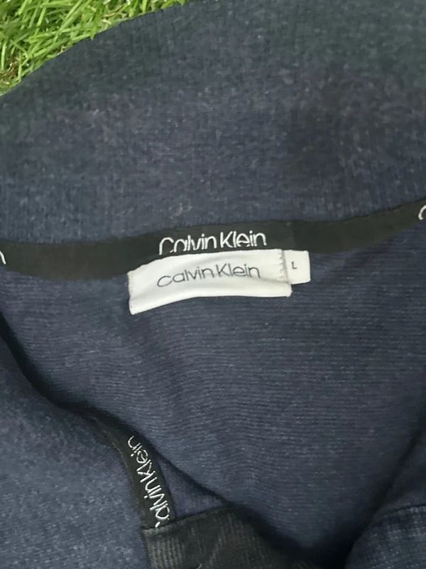 Calvin Klein navy blue polo shirt, embroidered logo on the chest. Mens Large