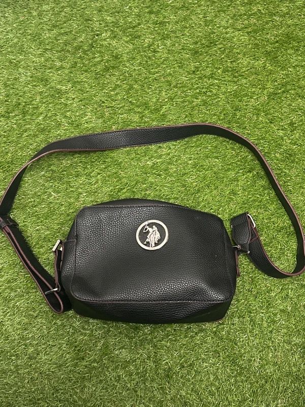 U.S. Polo Assn. black crossbody bag with zip closure