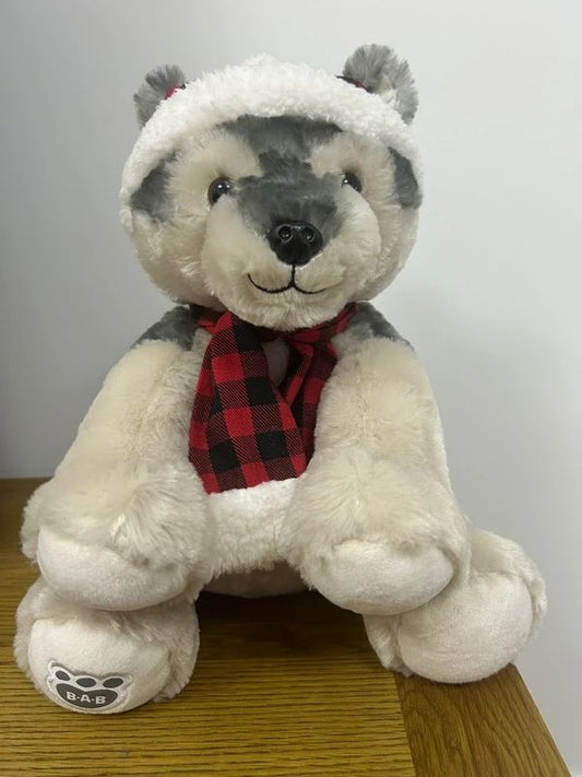 Build-A-Bear Workshop husky plush features a signature paw print logo.