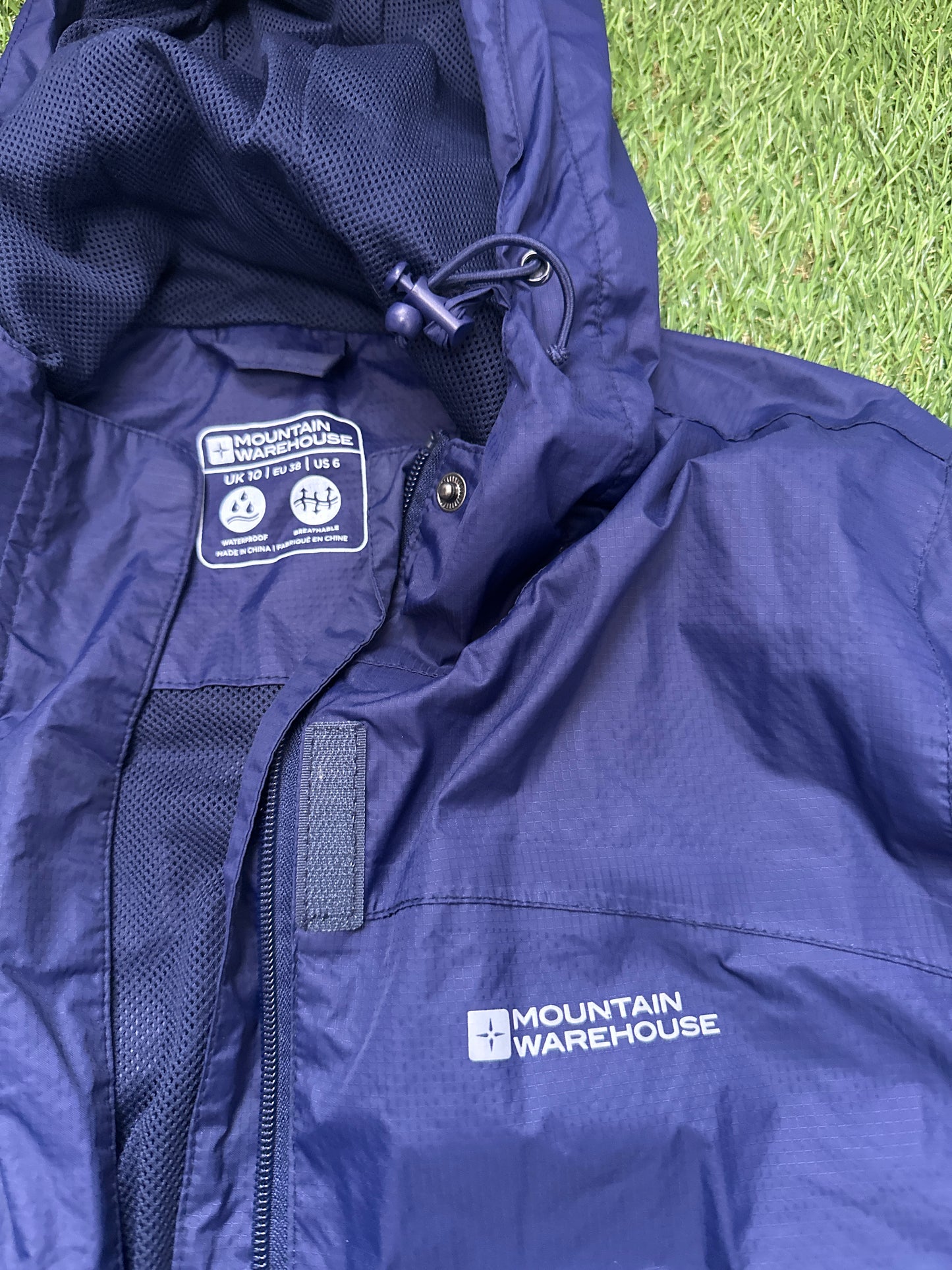 Mountain Warehouse Navy Waterproof Jacket Size 10 blue
