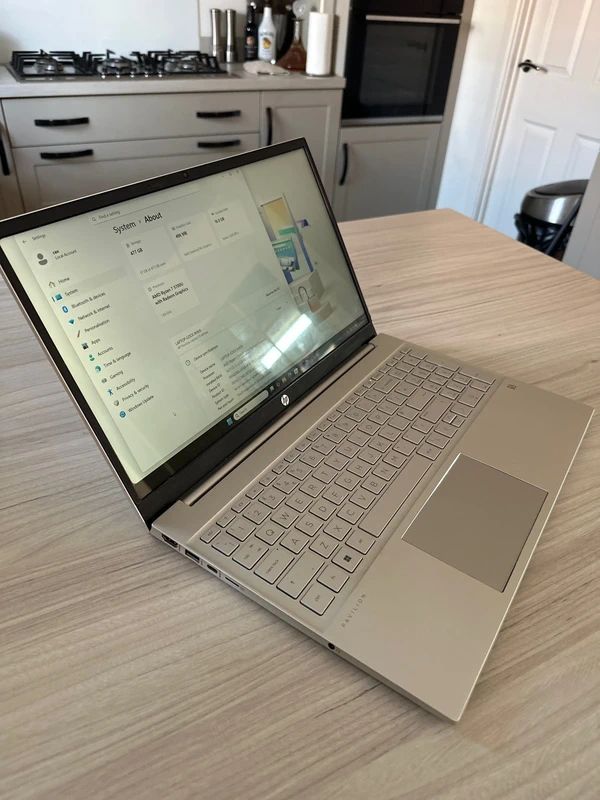 HP Pavilion Laptop 15-eh1xxx running Windows 11 with 16GB of RAM and an AMD Ryzen 7 5700U processor.